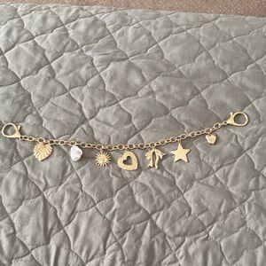 American Eagle Outfitters Gold bag charm